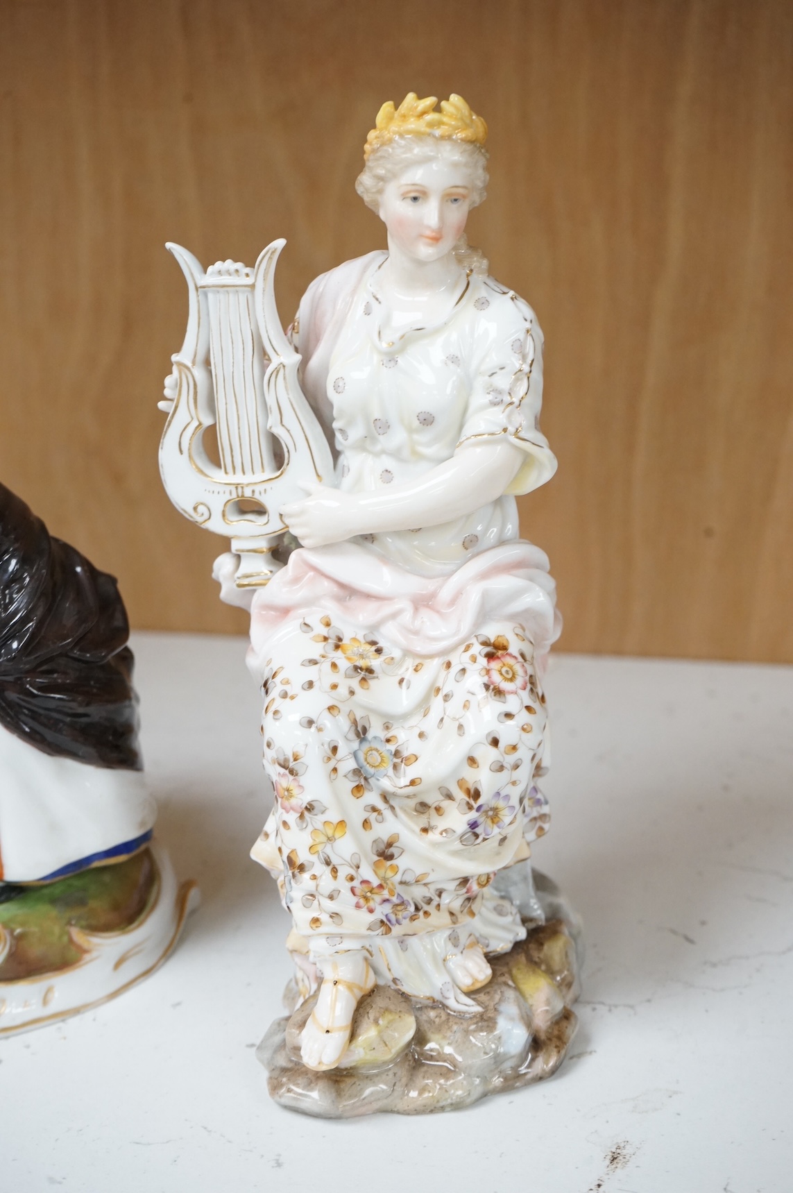 A Ludwigburg style group and a Volkstedt figure of a lyre player, 20cm high